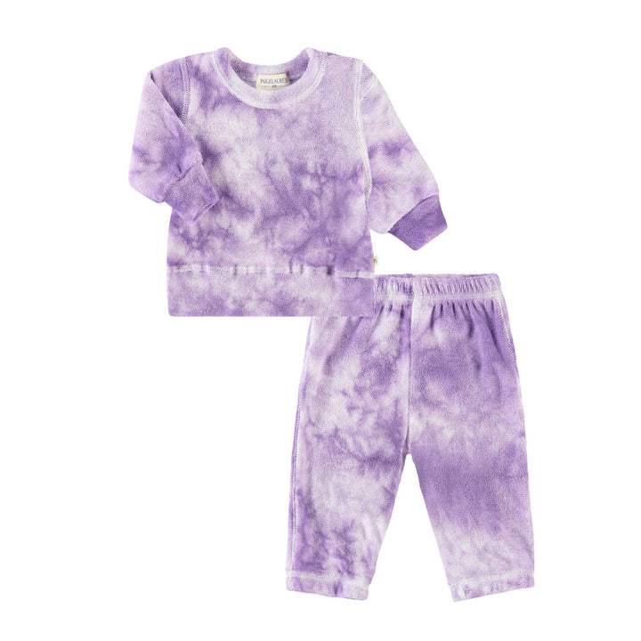 A toddler loungewear set with a marble print, featuring a long-sleeve pullover and matching pants in a purple hue.