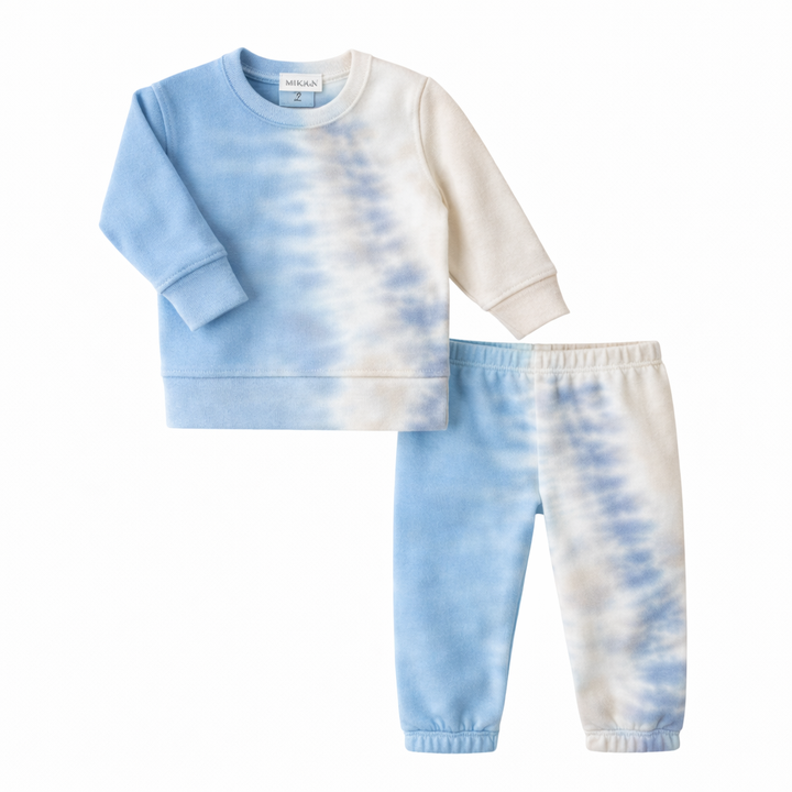 Tie-dye sweatshirt and pants set on a white background