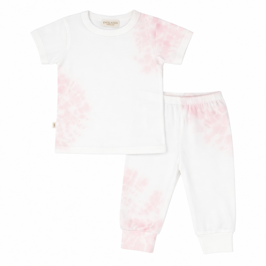 Pink and white tie-dye pajama set on a white background