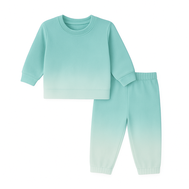 Mint green pajama set with a shirt and pants on a white background