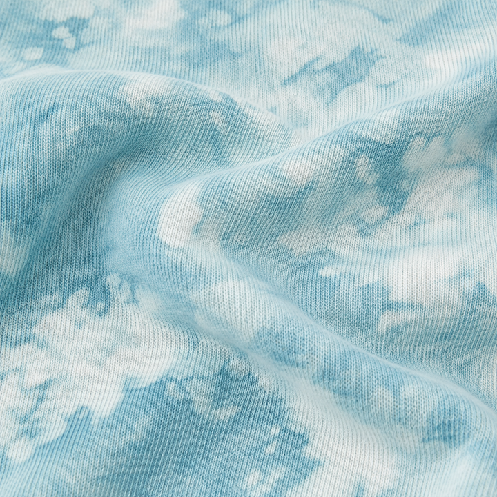 Close-up of PAIGELAUREN aqua marble Ultra Light French Terry fabric
