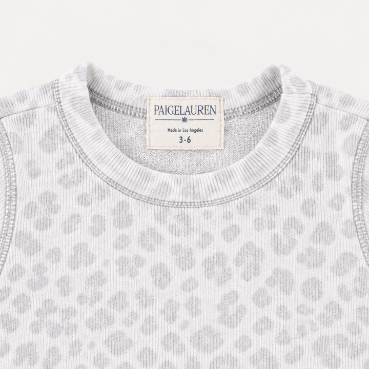 Close-up of PAIGELAUREN Gray and White Brushed Hacci animal print fabric