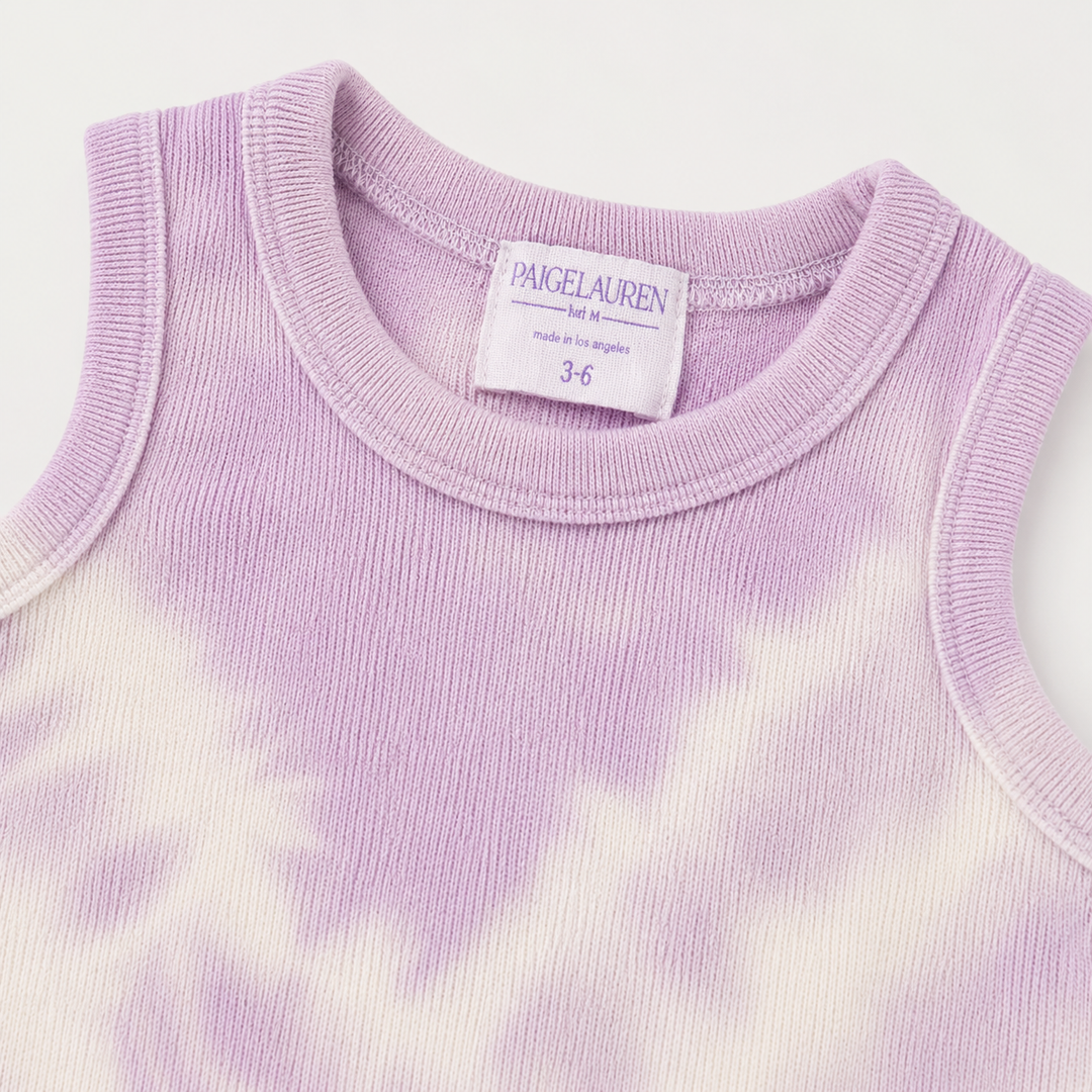 Close-up of the neckline, soft binding, and premium baby rib texture on the PAIGELAUREN Lavender Tie Dye Tank Overall
