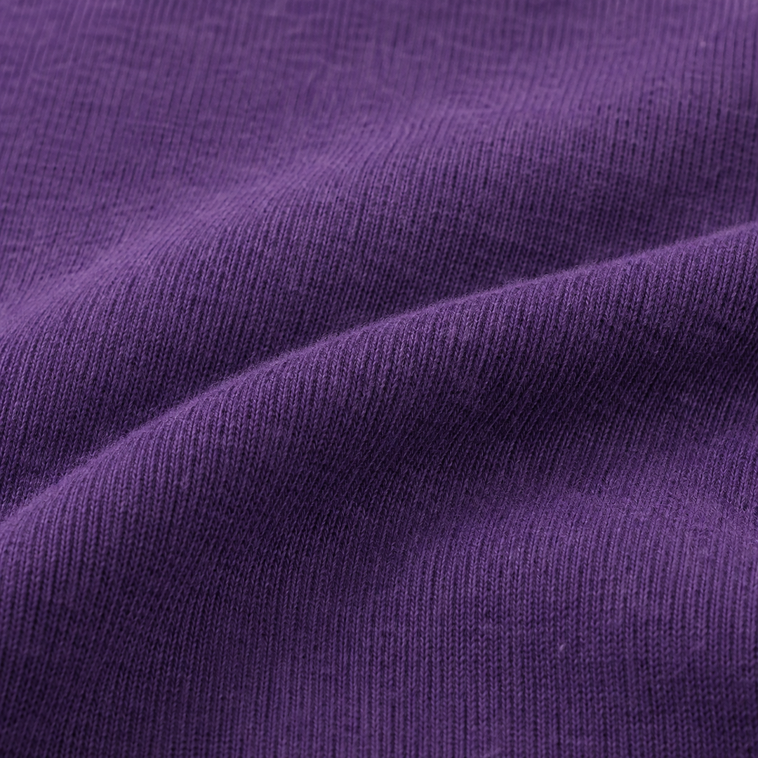 lose-up of the ultra-soft brushed fleece fabric on the PAIGELAUREN Fleece Sweatshirt Henley Romper