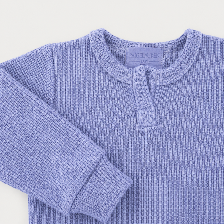 Close-up of Henley neckline and thermal sleeve detail on the PAIGELAUREN Garment Dyed Thermal Romper