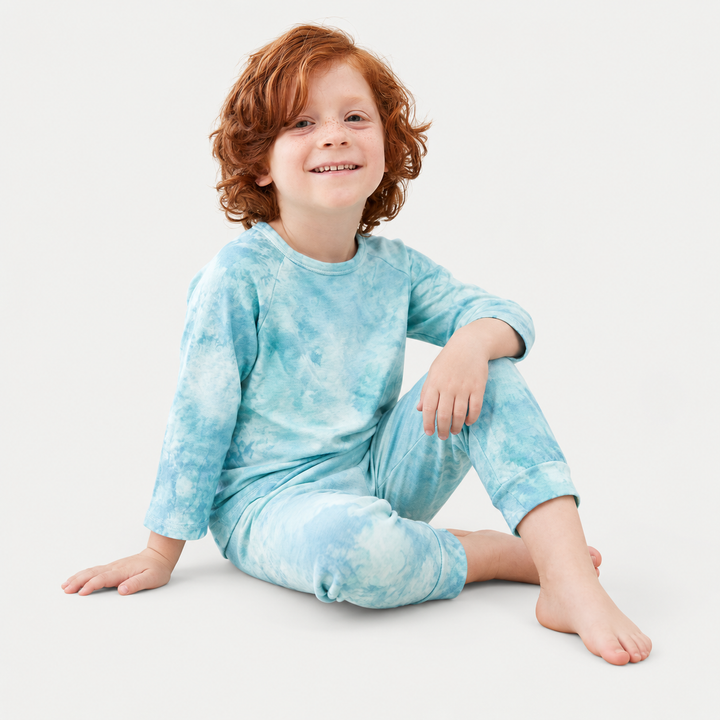 Child wearing PAIGELAUREN aqua marble French terry raglan tee and jogger