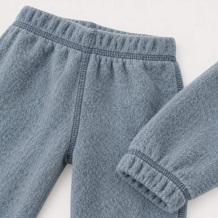 Blue brushed fleece sweatpant with elastic waistband and cuff detail