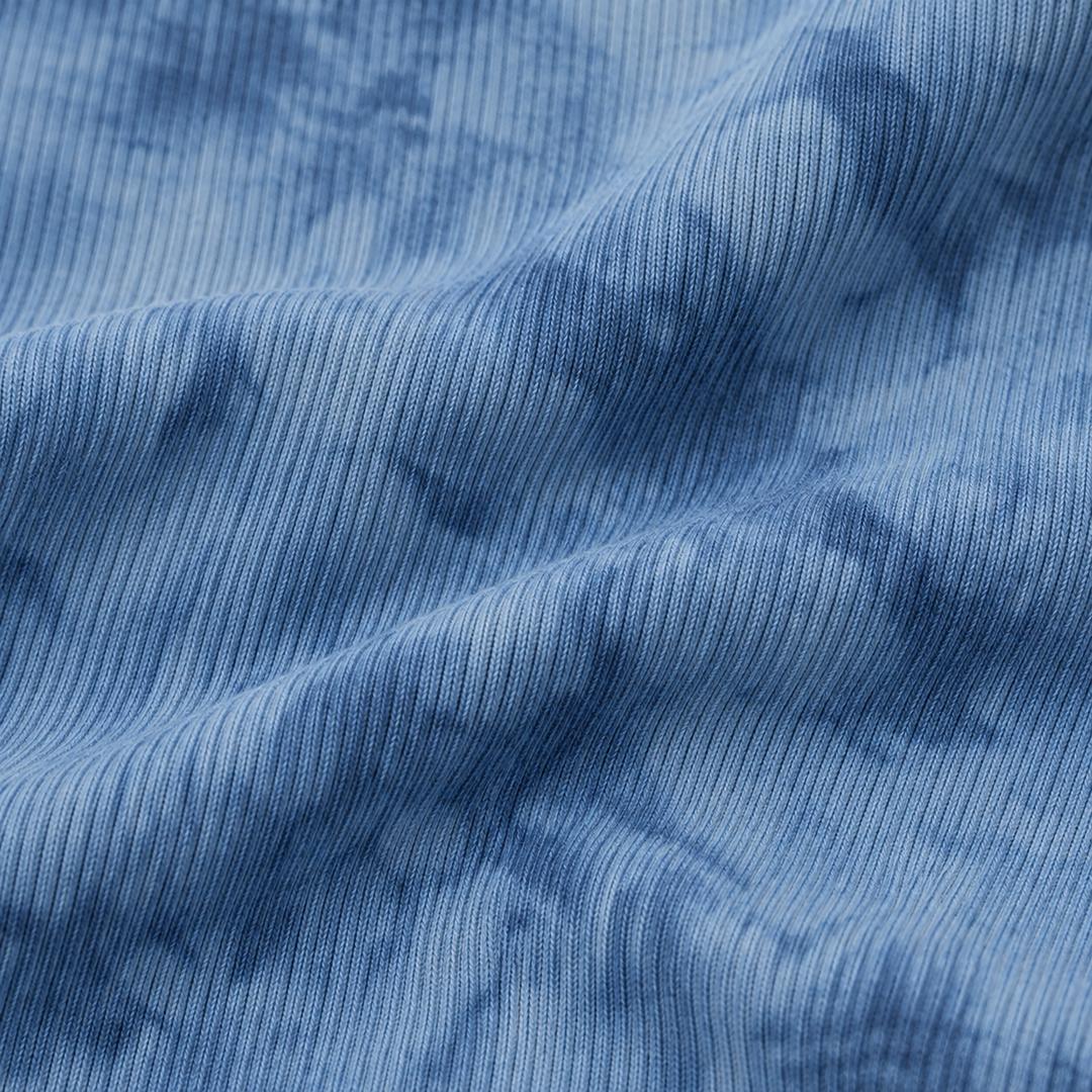 Close-up of PAIGELAUREN Blue Marble 2x1 Rib fabric and hand-dyed texture
