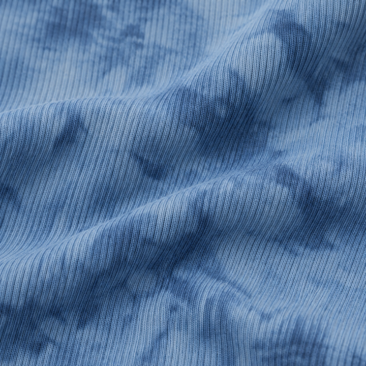 Close-up of PAIGELAUREN Blue Marble 2x1 Rib fabric and hand-dyed texture