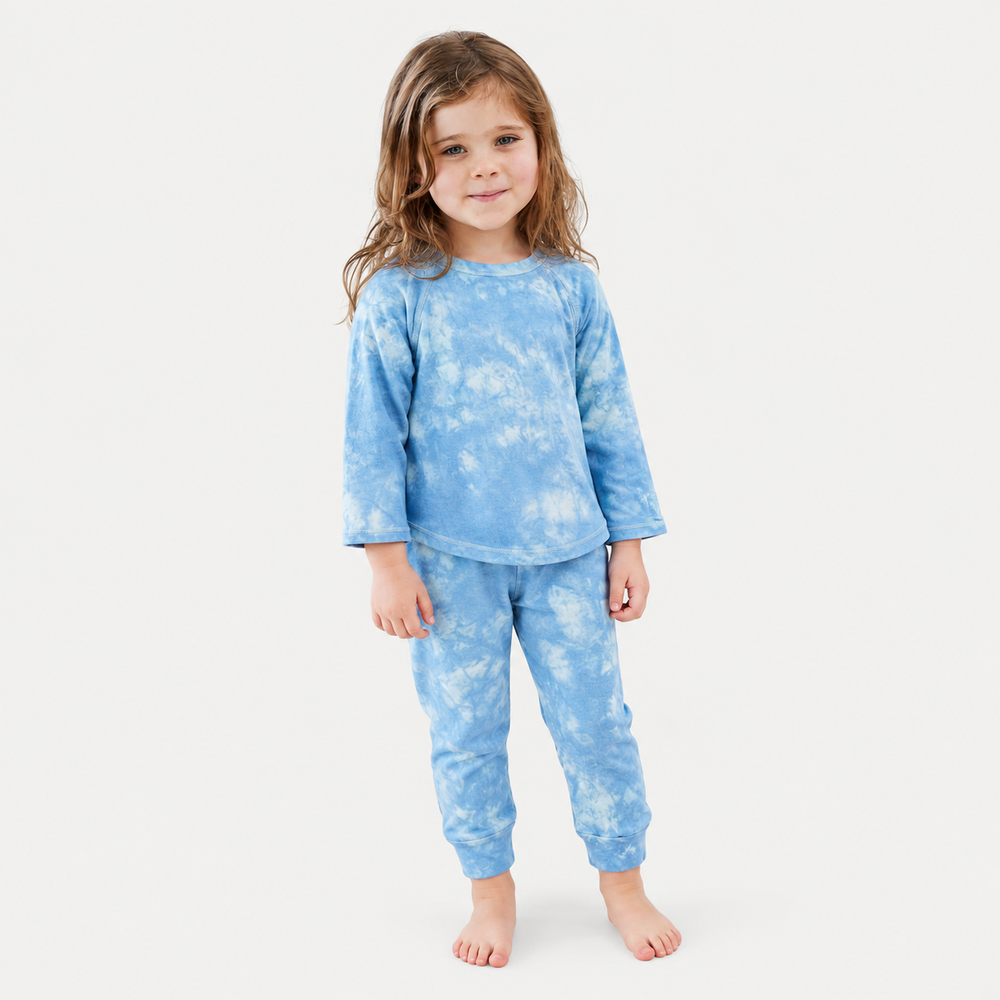 Child wearing PAIGELAUREN blue marble French terry raglan tee and jogger