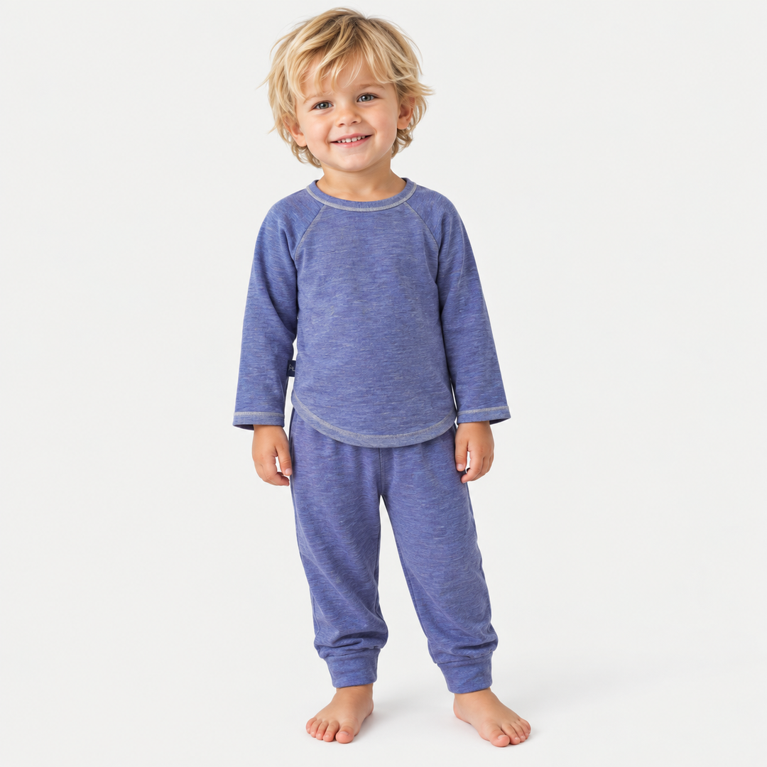 Blonde child wearing PAIGELAUREN blue marble slub rib tee and jogger set