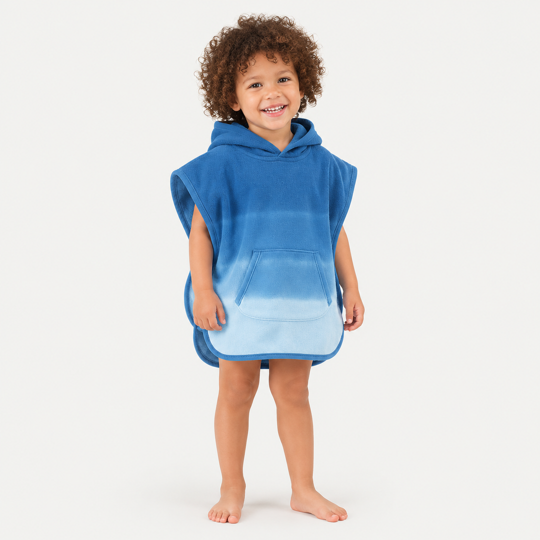 Toddler wearing PAIGELAUREN Blue Ombré Loop Terry Hooded Poncho