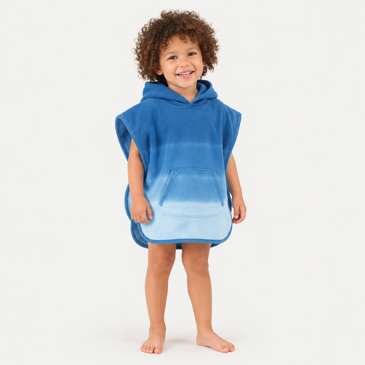 Toddler wearing PAIGELAUREN Blue Ombré Loop Terry Hooded Poncho