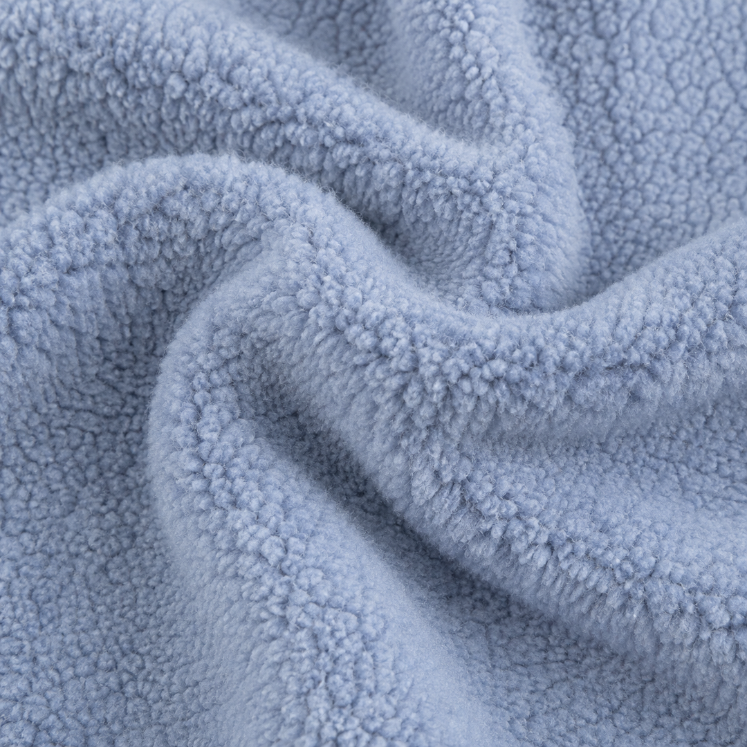 Close-up of ultra-soft PAIGELAUREN Blue Sherpa fabric