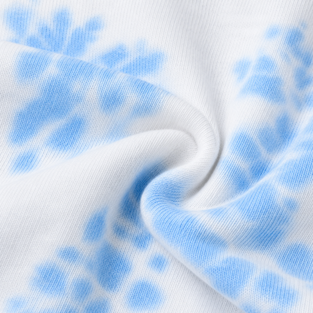 Close-up of PAIGELAUREN Blue and White tie dye ribbed fabric