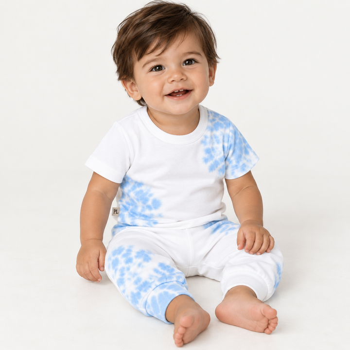 Baby boy wearing PAIGELAUREN Blue and White Tie Dye Ribbed Tee and Legging Set