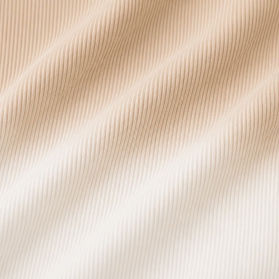Close-up of PAIGELAUREN Bone Dip Dye 2x1 rib fabric texture