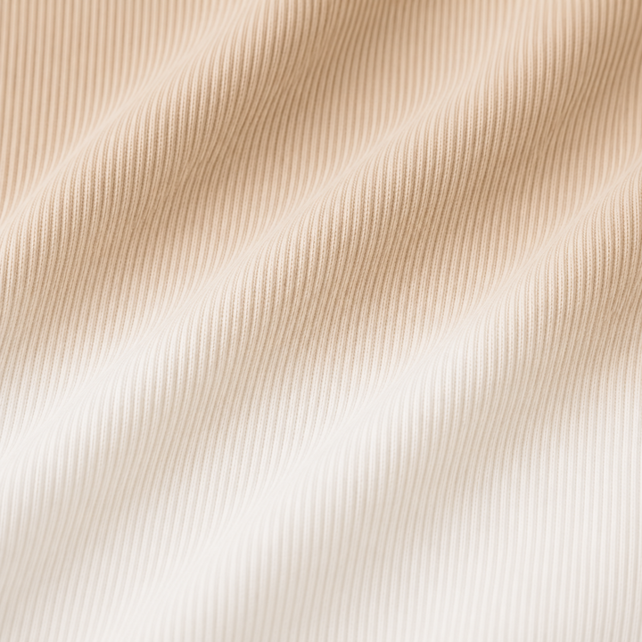 Close-up of PAIGELAUREN Bone Dip Dye 2x1 rib fabric texture