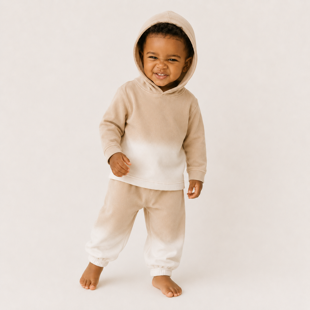 Toddler wearing PAIGELAUREN Bone Toddler Dip Dye Ribbed Hoodie and Baggy Pant Set