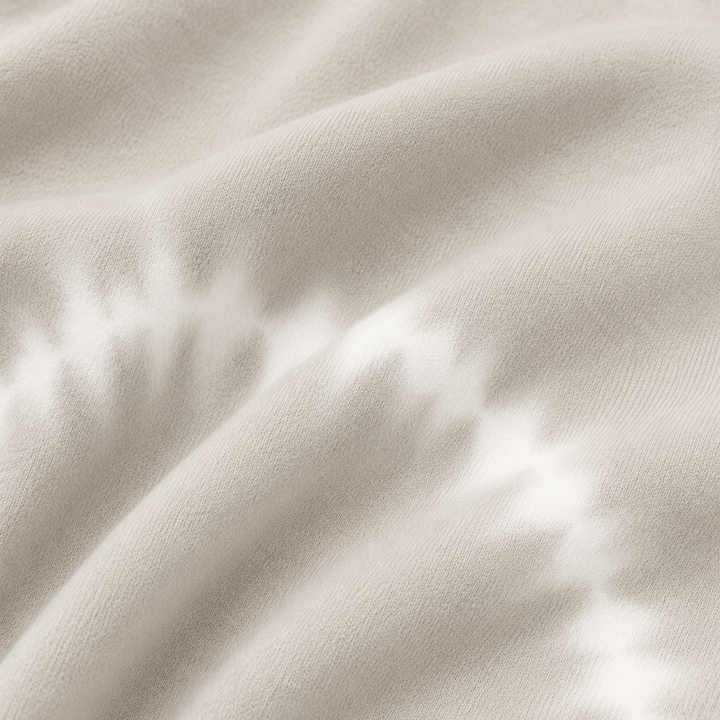 Close-up of PAIGELAUREN Bone Tie Dye super-soft fleece fabric