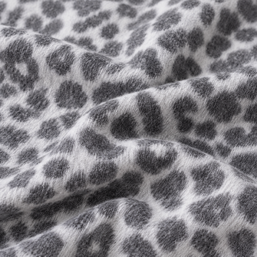 Close-up of PAIGELAUREN Black and White Brushed Hacci animal print fabric