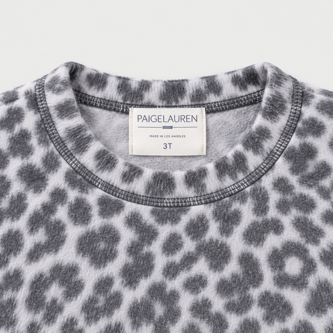 PAIGELAUREN Black and White Brushed Hacci pullover neckline and label detail