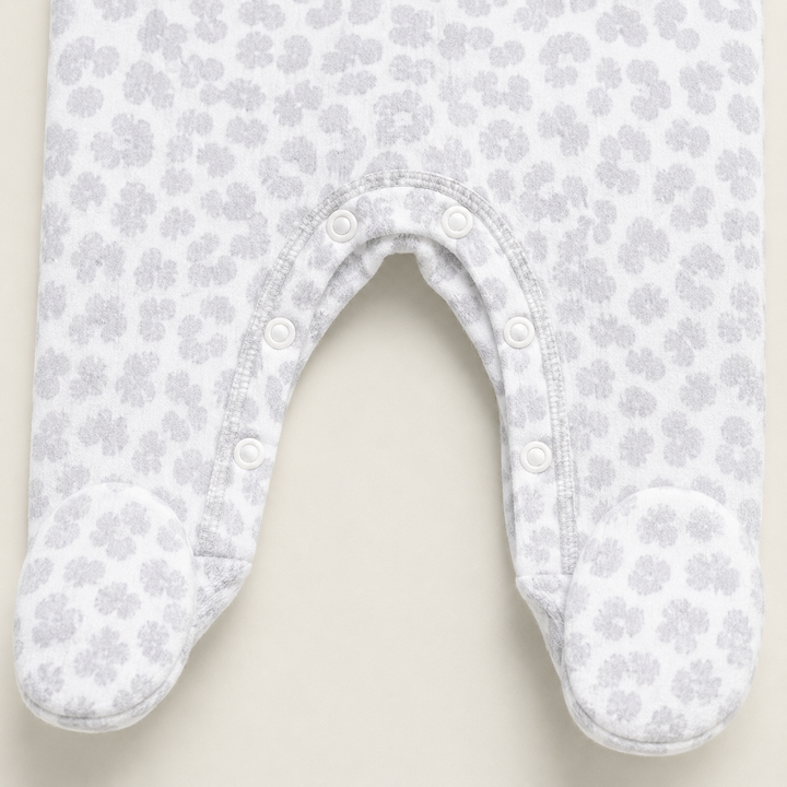 Tonal snap closure and built-in footie detail on PAIGELAUREN Gray and White Brushed Hacci Animal Romper
