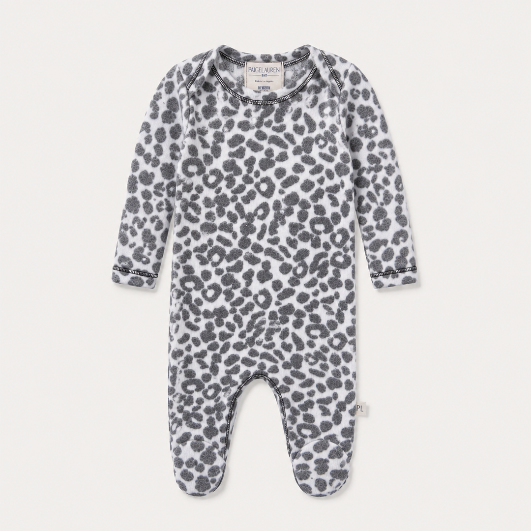 PAIGELAUREN Brushed Hacci Animal Pajama in black and white with soft animal print and footed design