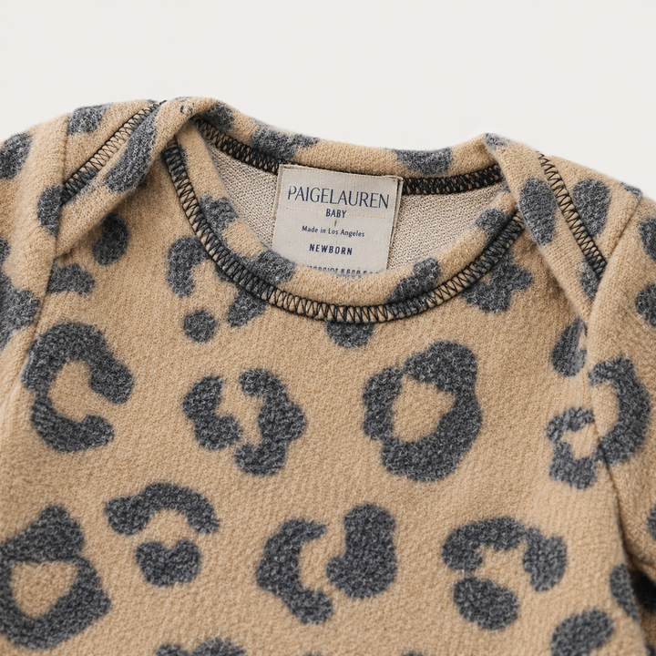 Neckline and label detail of PAIGELAUREN camel Brushed Hacci Animal Pajama
