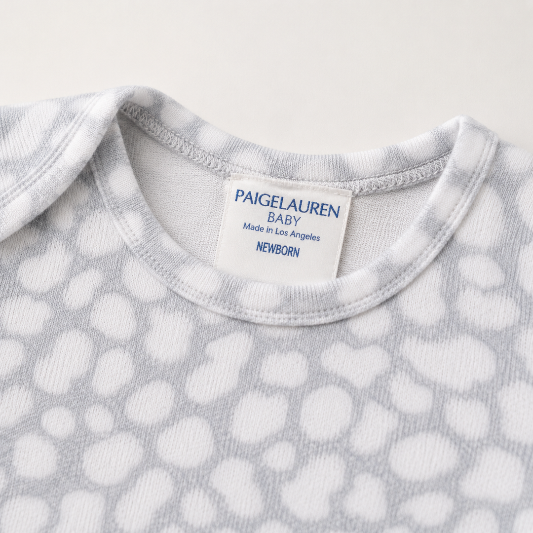 Neckline detail of PAIGELAUREN gray Brushed Hacci Animal Pajama with lap shoulder and neck label
