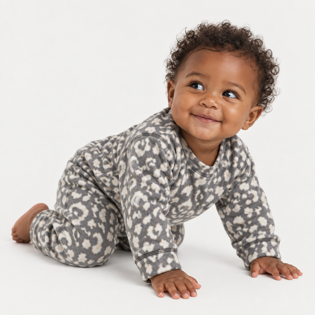 Baby wearing PAIGELAUREN Gray and Cream Brushed Hacci Animal Pullover and Pant Set