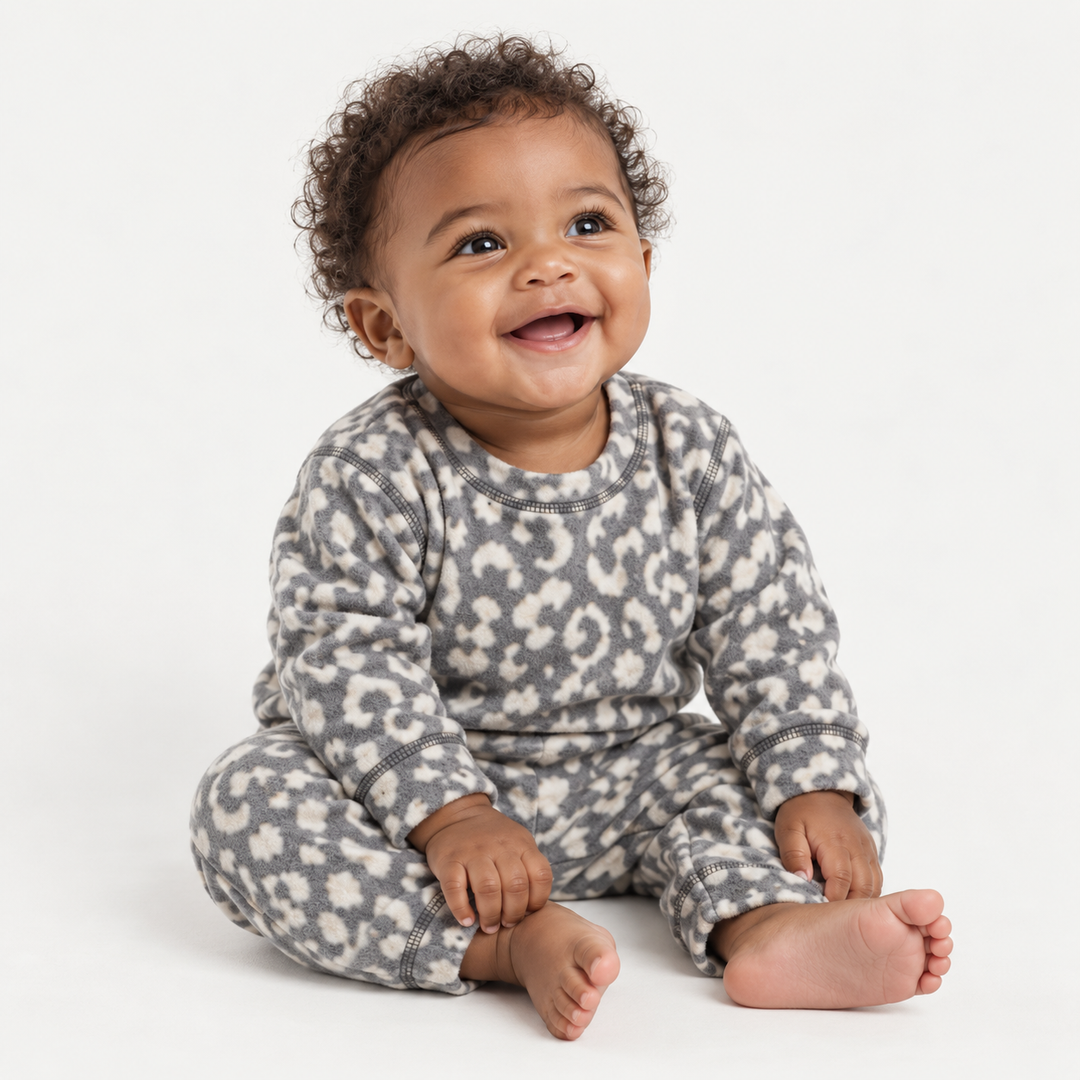Baby wearing PAIGELAUREN Gray and Cream Brushed Hacci Animal Pullover and Pant Set
