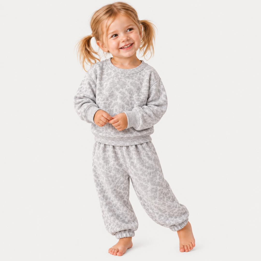 Toddler wearing PAIGELAUREN Gray and Taupe Brushed Hacci Animal Pullover and Pant Set