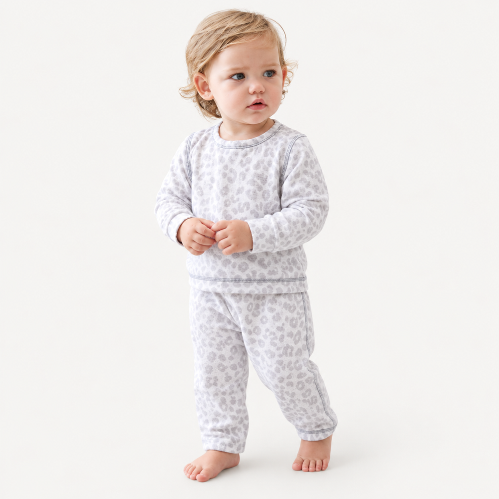 Toddler wearing PAIGELAUREN Gray and White Brushed Hacci Animal Pullover and Pant Set