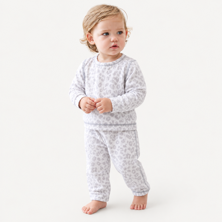 Toddler wearing PAIGELAUREN Gray and White Brushed Hacci Animal Pullover and Pant Set