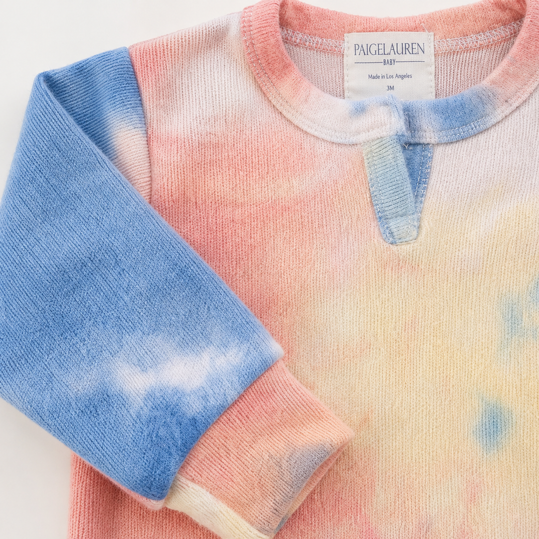 Brushed Hacci sleeve cuff and tie dye detail on the PAIGELAUREN romper.