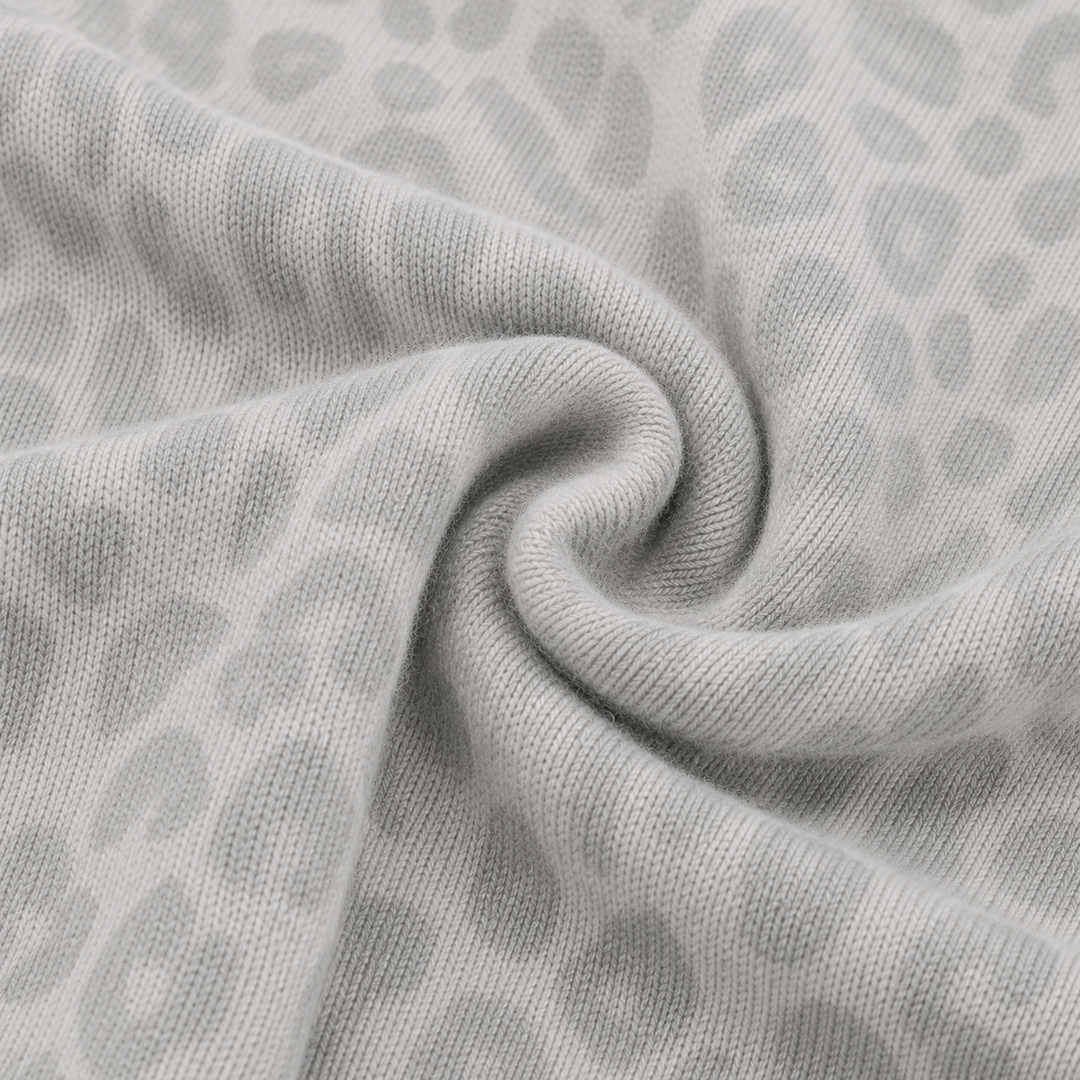 Close-up of the brushed Hacci fabric with a cashmere-soft texture and tonal animal print. Gray/Taupe