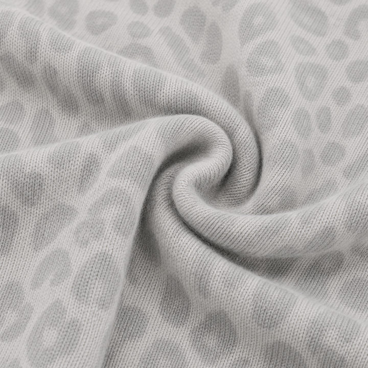 Close-up of the brushed Hacci fabric with a cashmere-soft texture and tonal animal print. Gray/Taupe