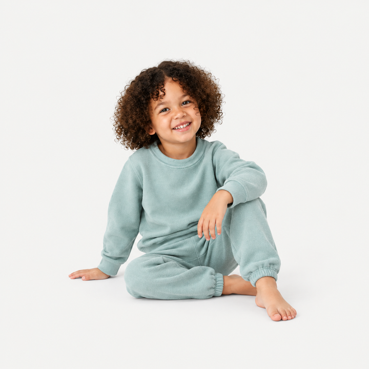 Child wearing soft Seafoam Green PAIGELAUREN Brushed Hacci Loungewear Set