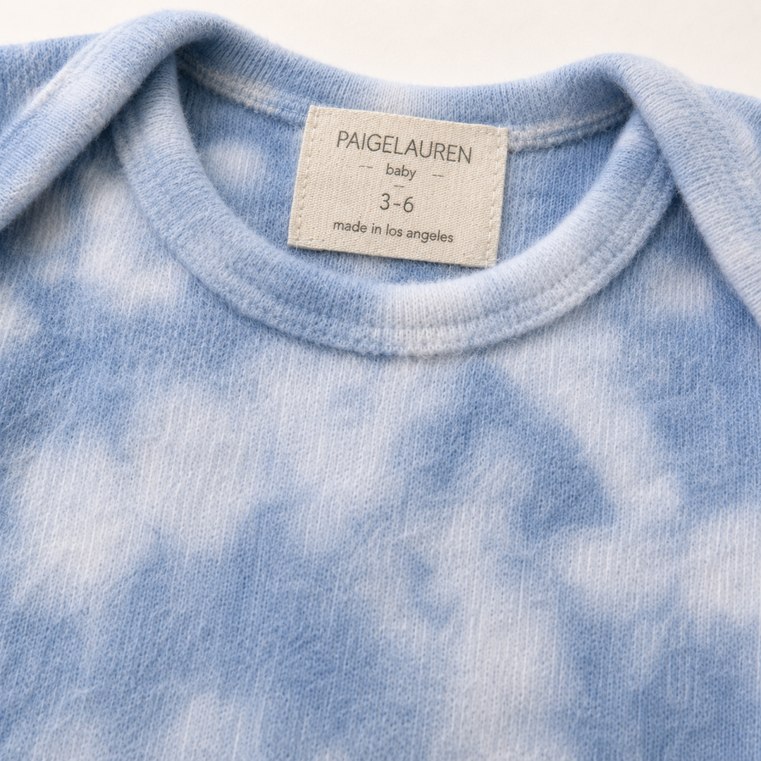 Neckline detail of PAIGELAUREN blue Marble Brushed Hacci Pajama with lap shoulder design