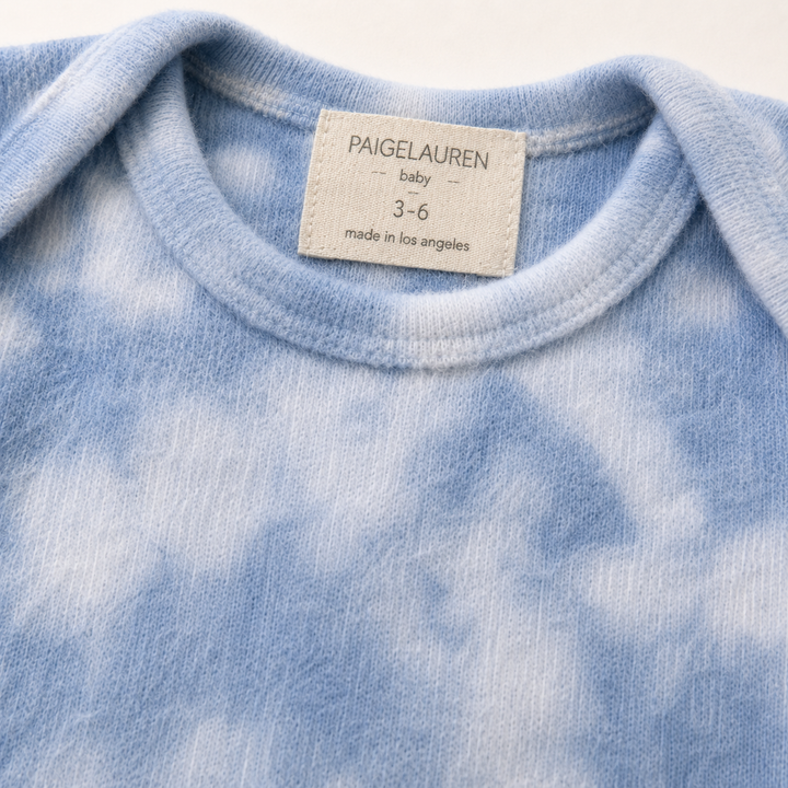 Neckline detail of PAIGELAUREN blue Marble Brushed Hacci Pajama with lap shoulder design