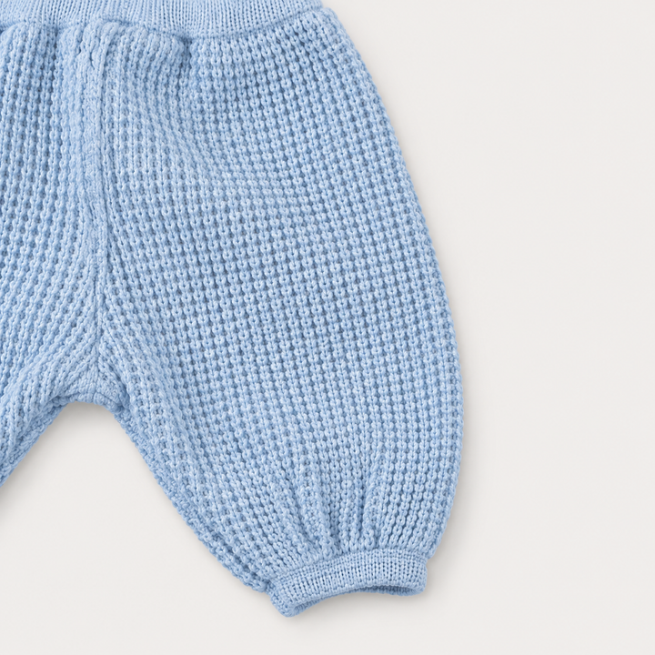Close-up of PAIGELAUREN Powder Blue chunky thermal pant construction and waffle texture