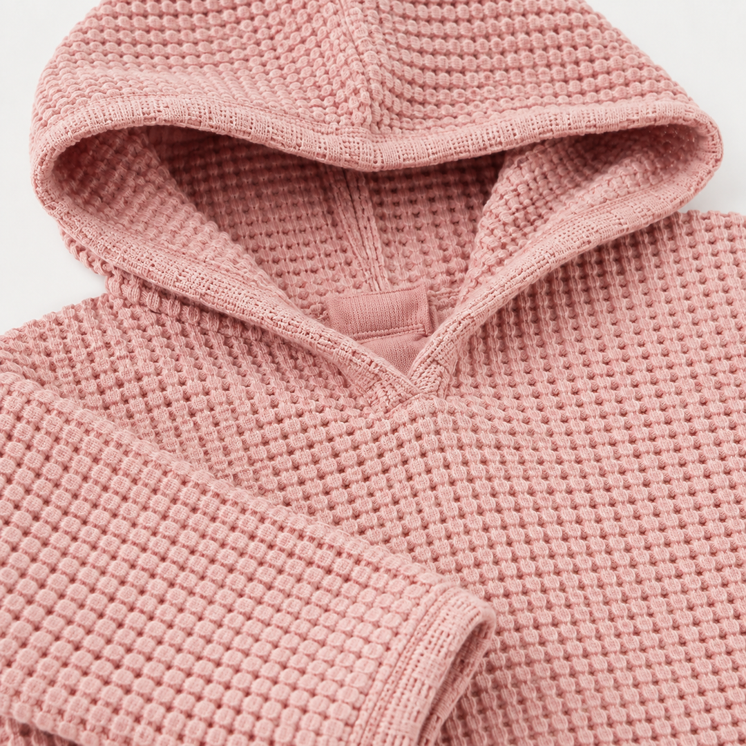 Close-up of PAIGELAUREN Shell Pink chunky thermal hoodie neckline and textured hood