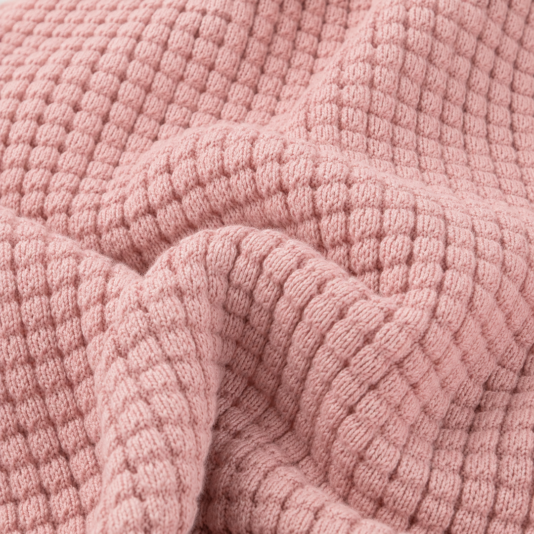 Close-up of Shell Pink chunky thermal waffle knit fabric by PAIGELAUREN
