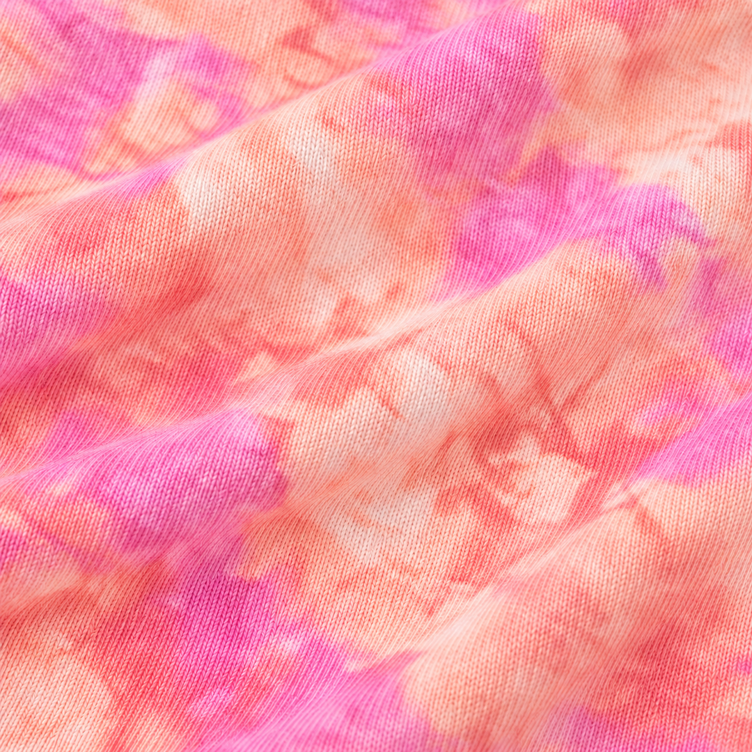 Close-up of PAIGELAUREN coral pink Ultra Light French Terry fabric