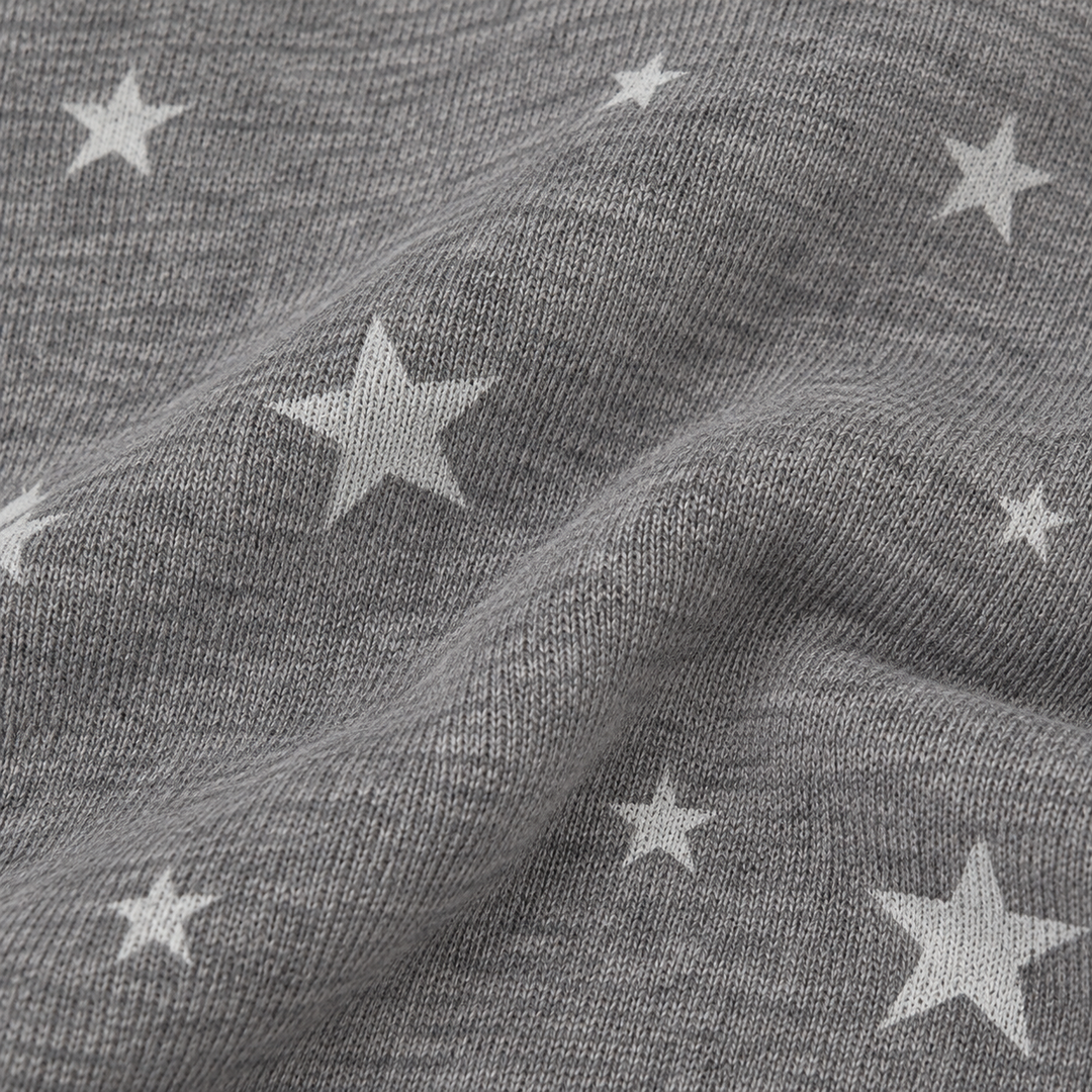 Close-up of PAIGELAUREN Dark Gray Fleece with allover white star print