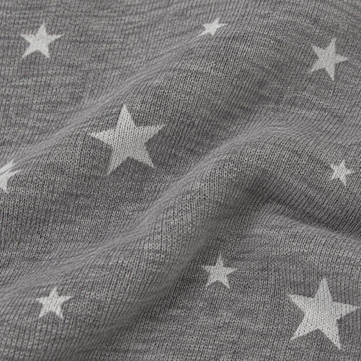 Close-up of PAIGELAUREN Dark Gray Fleece with allover white star print