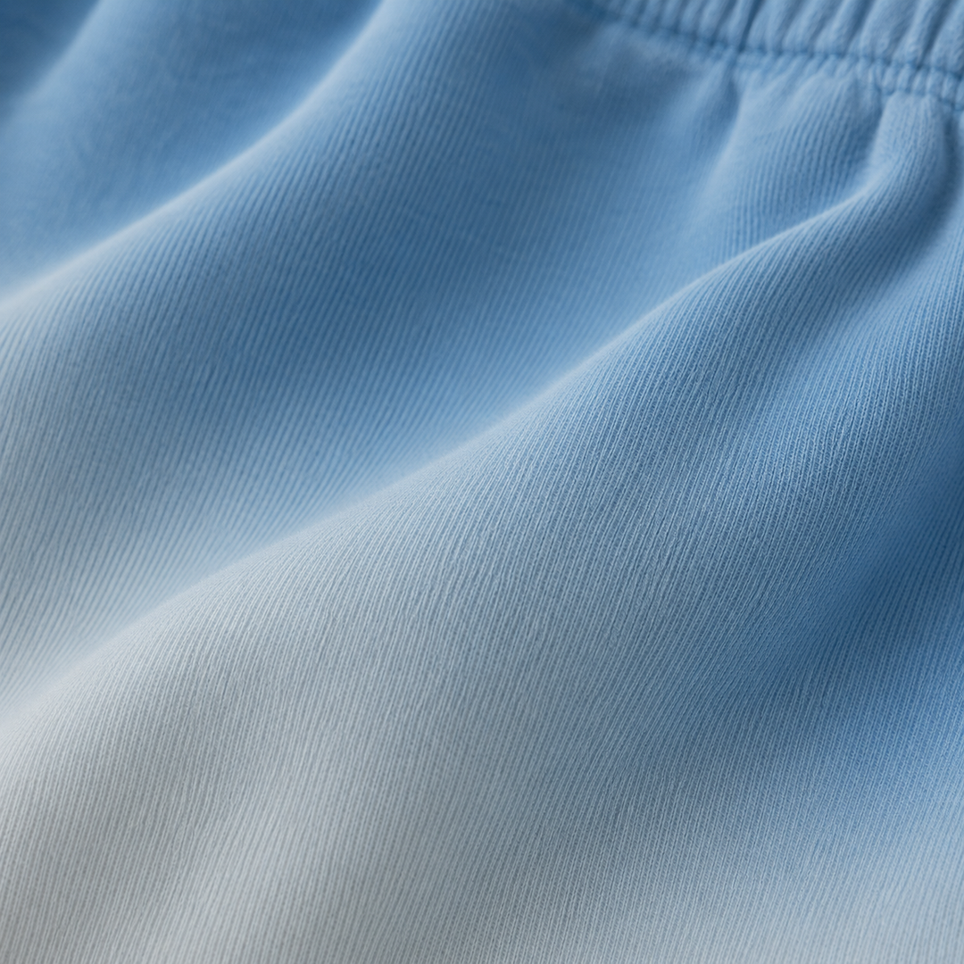 Close-up of super-soft PAIGELAUREN Ombre Blue dip dye fleece fabric