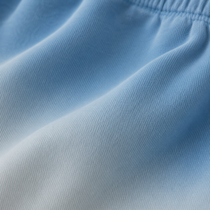 Close-up of super-soft PAIGELAUREN Ombre Blue dip dye fleece fabric