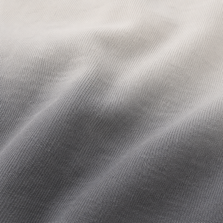 Close-up of super-soft PAIGELAUREN Ombre Gray dip dye fleece fabric